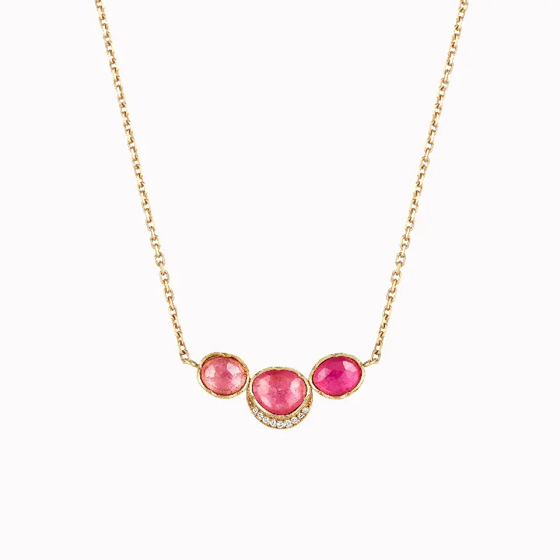 real peridot gemstone ring Orbit Three Pink Sapphire Halo Necklace