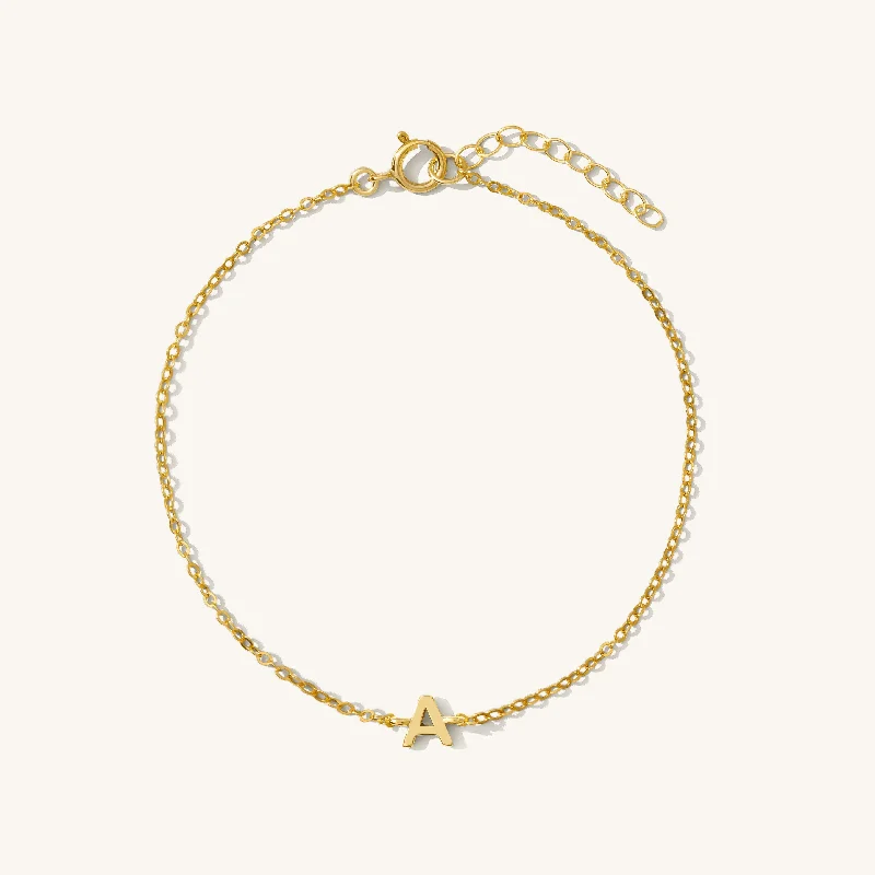 classic diamond solitaire earrings Tiny Initial Bracelet
